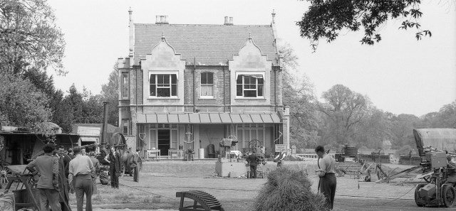 A black and white photograph of Old Whiteknights House in 1954 when a BBC TV came to film the new Museum of English Rural Life