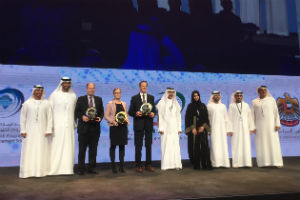 Professor Giles Harrison receives the award in Abu Dhabi