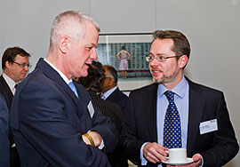 Vice-Chancellor Sir David Bell and Dominic Malsom who graduated from the University in 1991