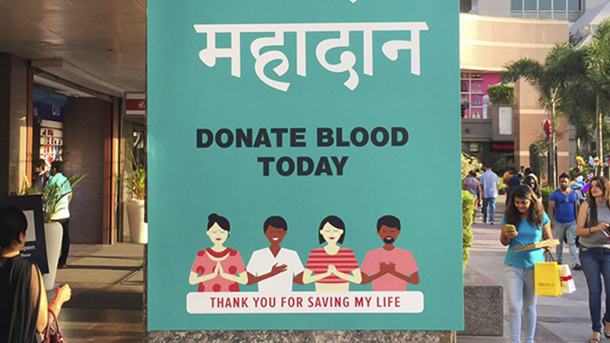 Blood donation poster for India with Bengali-script typeface designed by Professor Fiona Ross