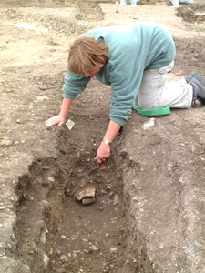 The trench being excavated