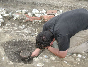 Excavating the Silchester Ware
 vessel