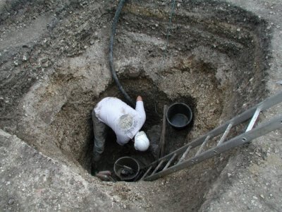 One of the deep wells being excavated
