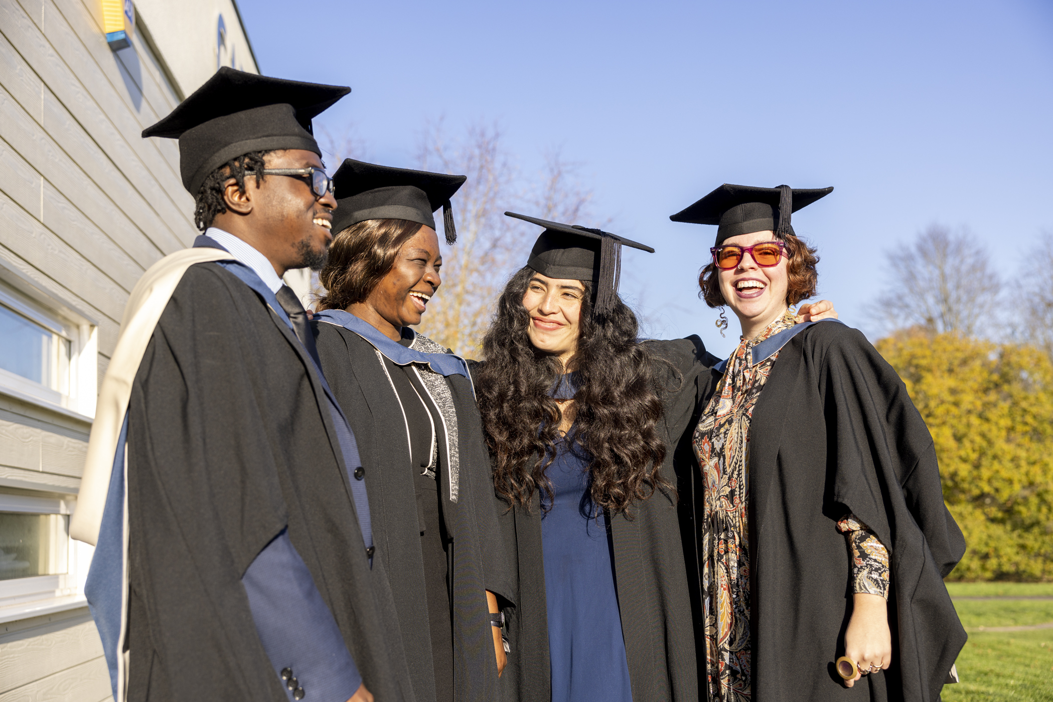 GIIDAE Postgraduate Students in Graduation robes.