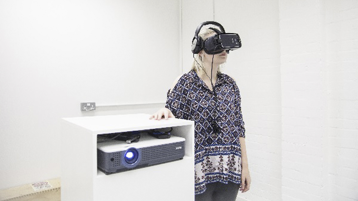 Student, Frances Glazier, uses  a virtual reality headset