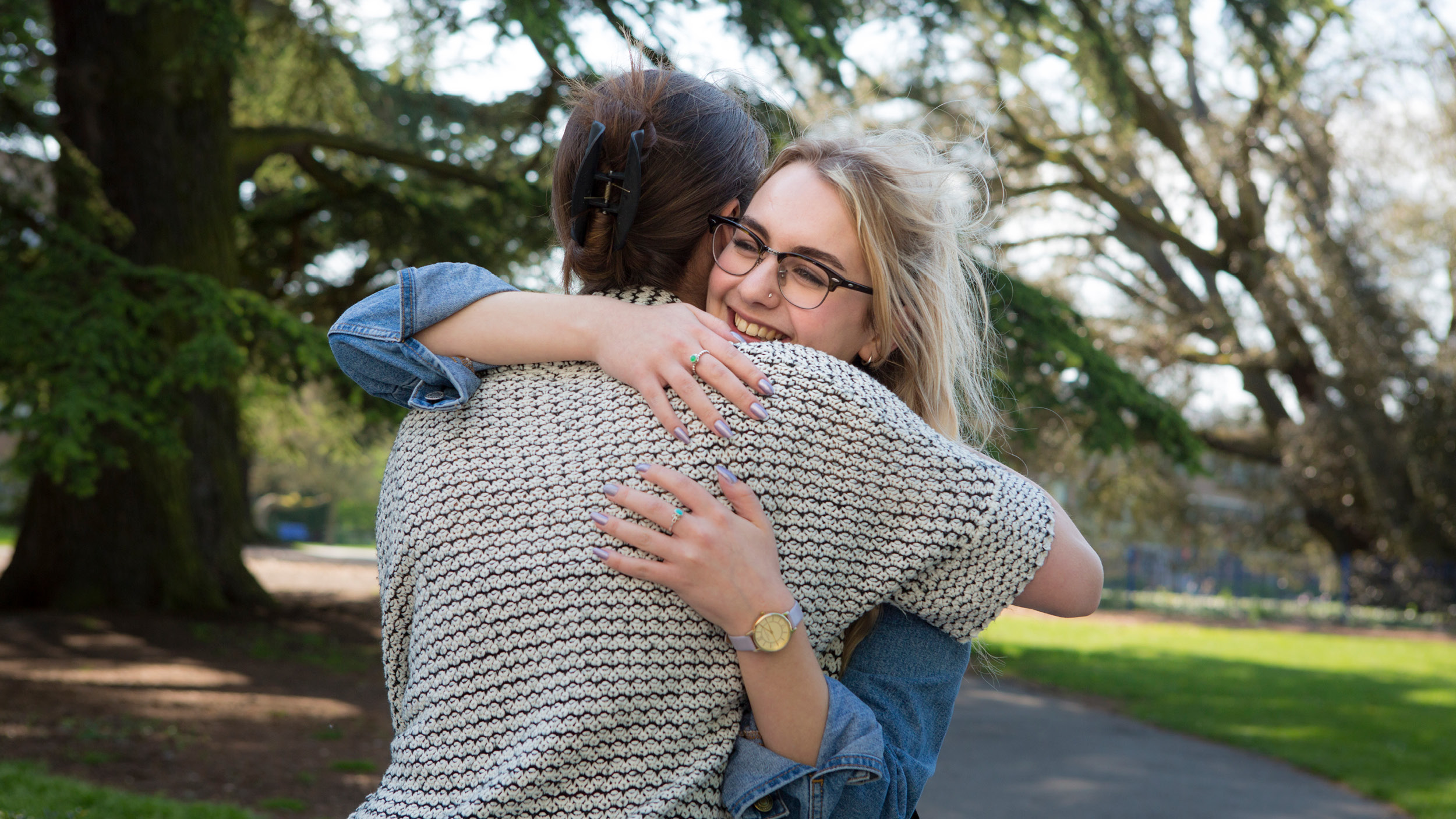 Students share a hug on Whiteknights campus