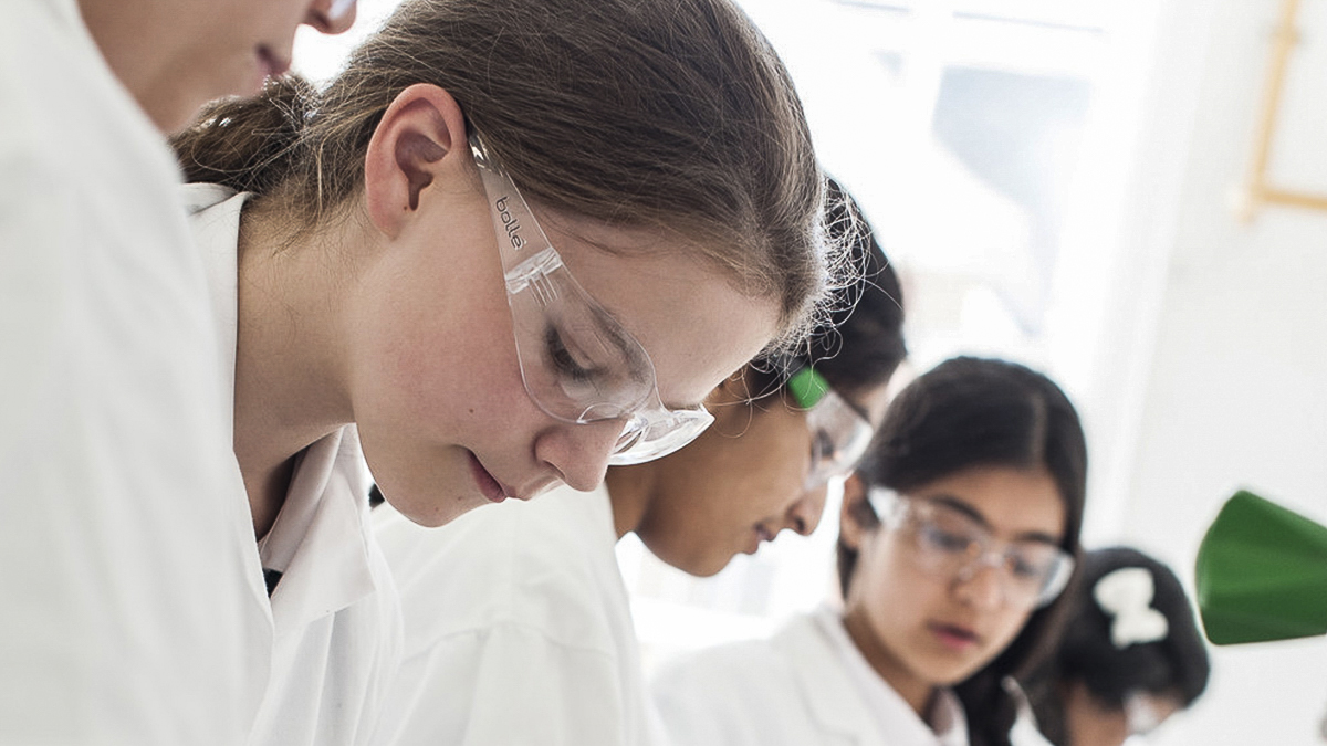 Group of secondary school pupils in a lab
