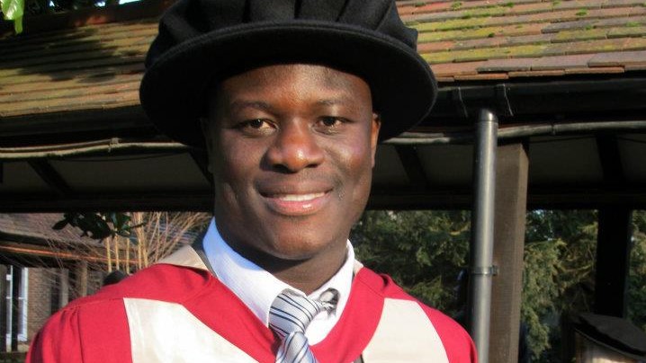 Samuel Laryea posing for a photo during his PhD graduation ceremony 