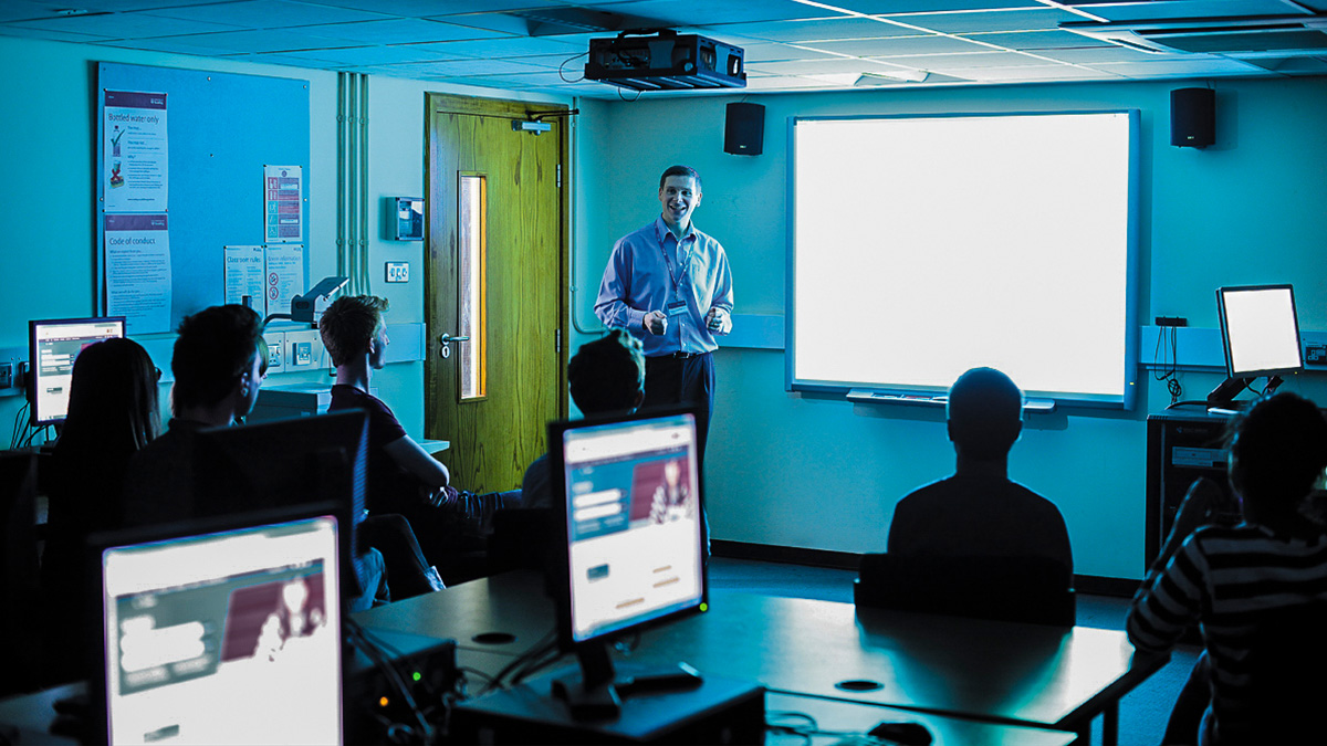 An academic teaching in a computer lab