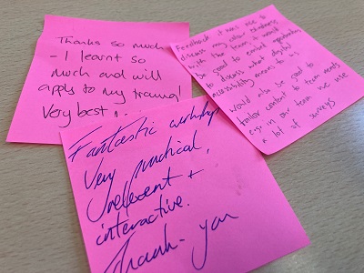 Post-it notes with feedback scribbled