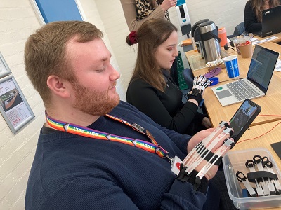 Participants trying Cambridge Simulation Gloves