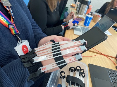 Participant trying Cambridge Simulation gloves