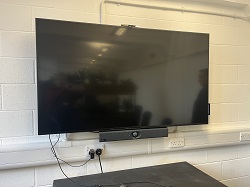 Photo of a monitor on a wall