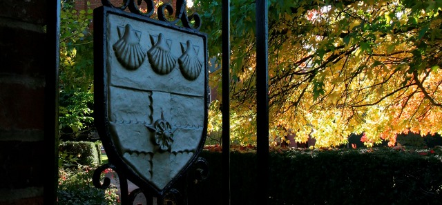 University of Reading coat of arms on a gate