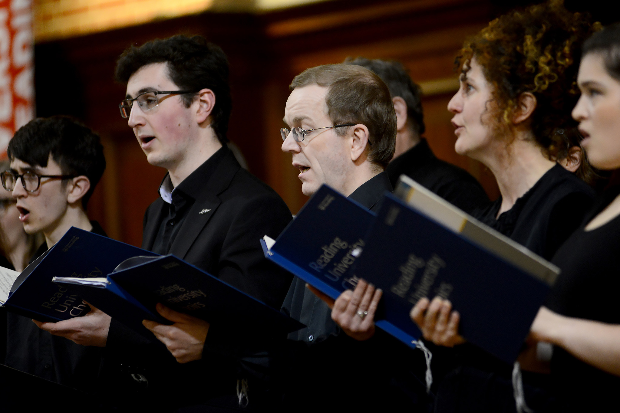 Choir singers close-up at the Ben Pedley memorial concert 