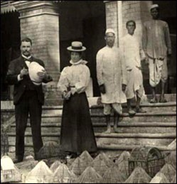 Sir Ronald Ross with his wife Rosa Bessie Bloxam, and his Indian laboratory assistants standing behind them, from London School of Tropical Medicine.