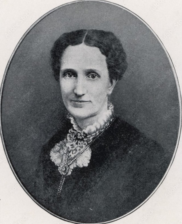 Black and white portrait of a woman in Victorian clothing.
