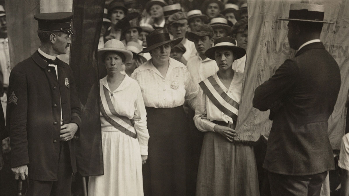A large group of suffragists peacefully protesting