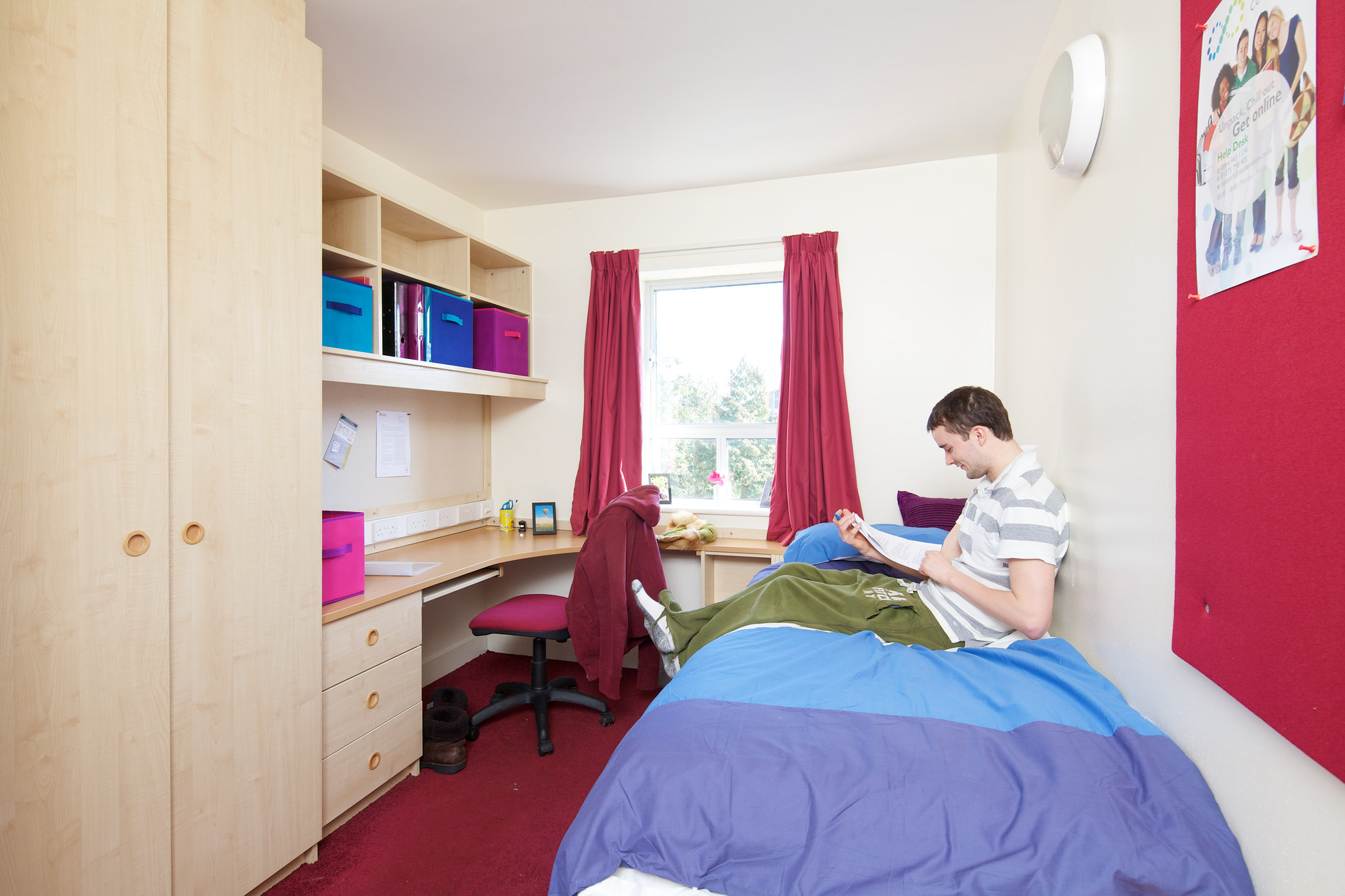 Student in Benyon Hall room