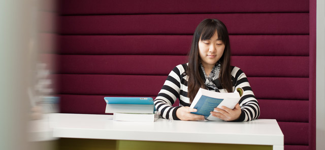 Girl reading in study area