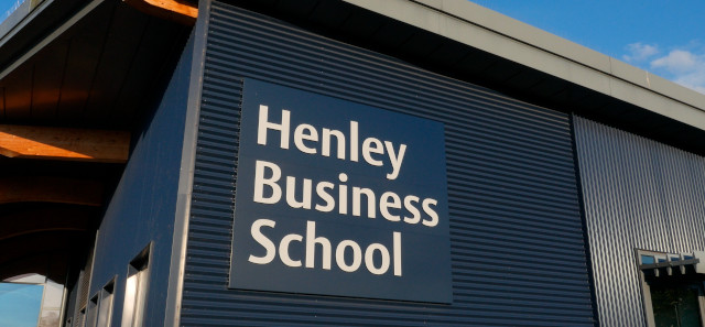 The Henley Business School sign on the side of it's main building on Whiteknights campus. 