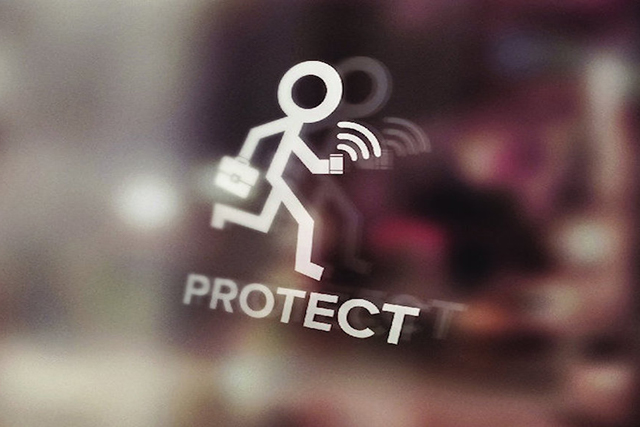 Graphic of a stick figure with a suitcase and mobile phone above the word 'protect'