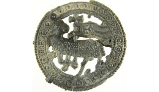 Medieval pilgrim badge showing the Lamb of God with Greek banner