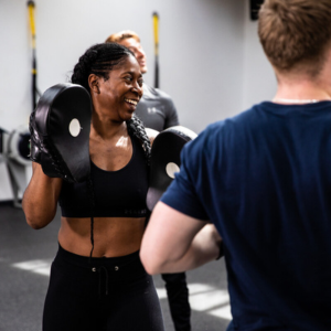 Two UoR Sports Park members practising boxing.