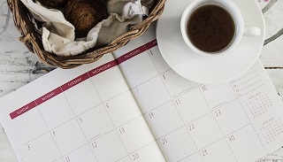 Coffee cup and calendar