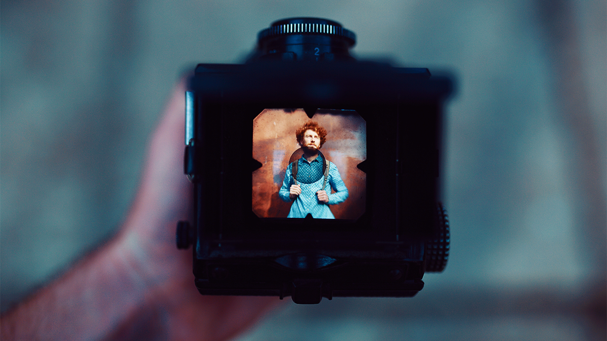 Close up of a camera's viewfinder showing a photograph taken of an actor in costume