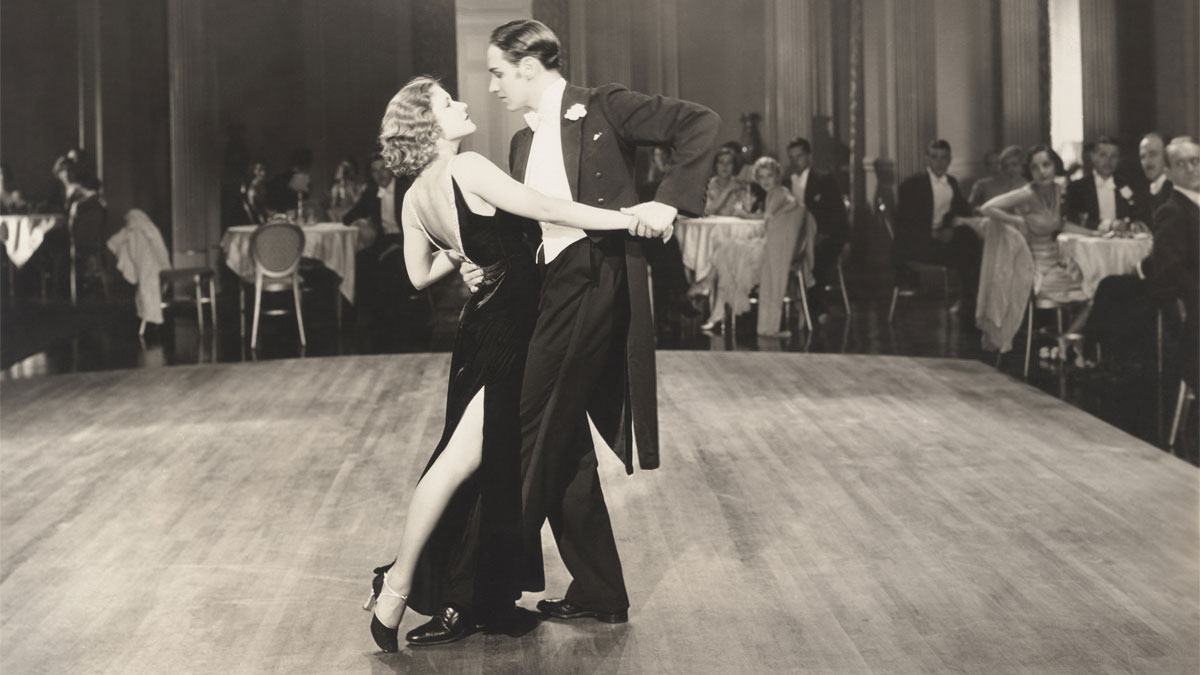vintage photograph of a couple dancing in a ballroom