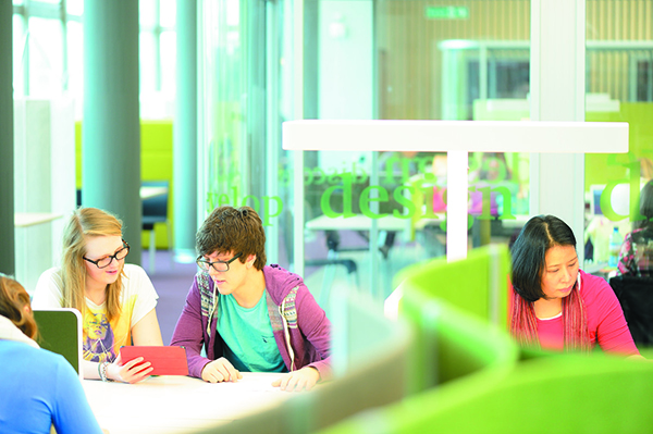 Students studying on the 2nd Floor of the Library