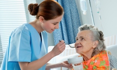 Patient being fed in hospital