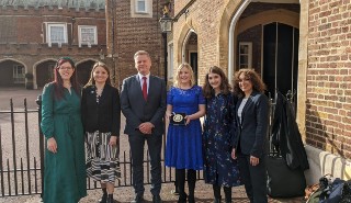 The vice Chancellor and members of the University's Meteorology department at St James' Palace to receive the Queen's Anniversary Prize