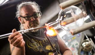Mark McClemont, a senior technician, creating specialist glass lab equipment