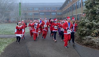 Runners taking part in the Santa Run at the University of Reading