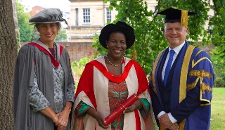 Left to right: Professor Carol Wagstaff, Professor Joyce Kikafunda and Professor Robert Van de Noort in their ceremonial robes