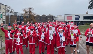 Lots of race participants dressed in Santa outfits
