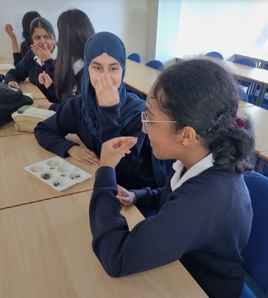 Female South-Asian students from Reading Girls' School taking part in a chocolate tasting experiment