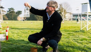 Simon Armitage taking rain measurements