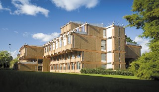 The URS building on Whiteknights campus, against a blue sky