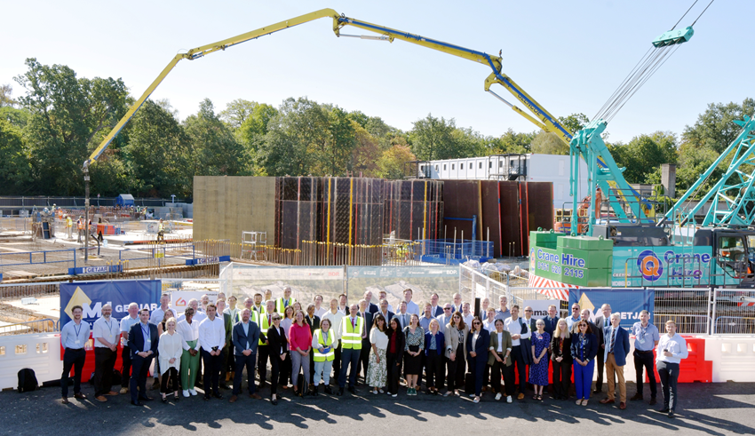 A crowd of people stood in front of the ECMWF construction site