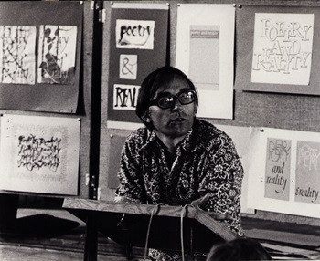 Black and white photo of Michael Twyman teaching