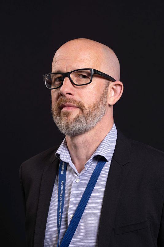 Headshot of Darius Widera