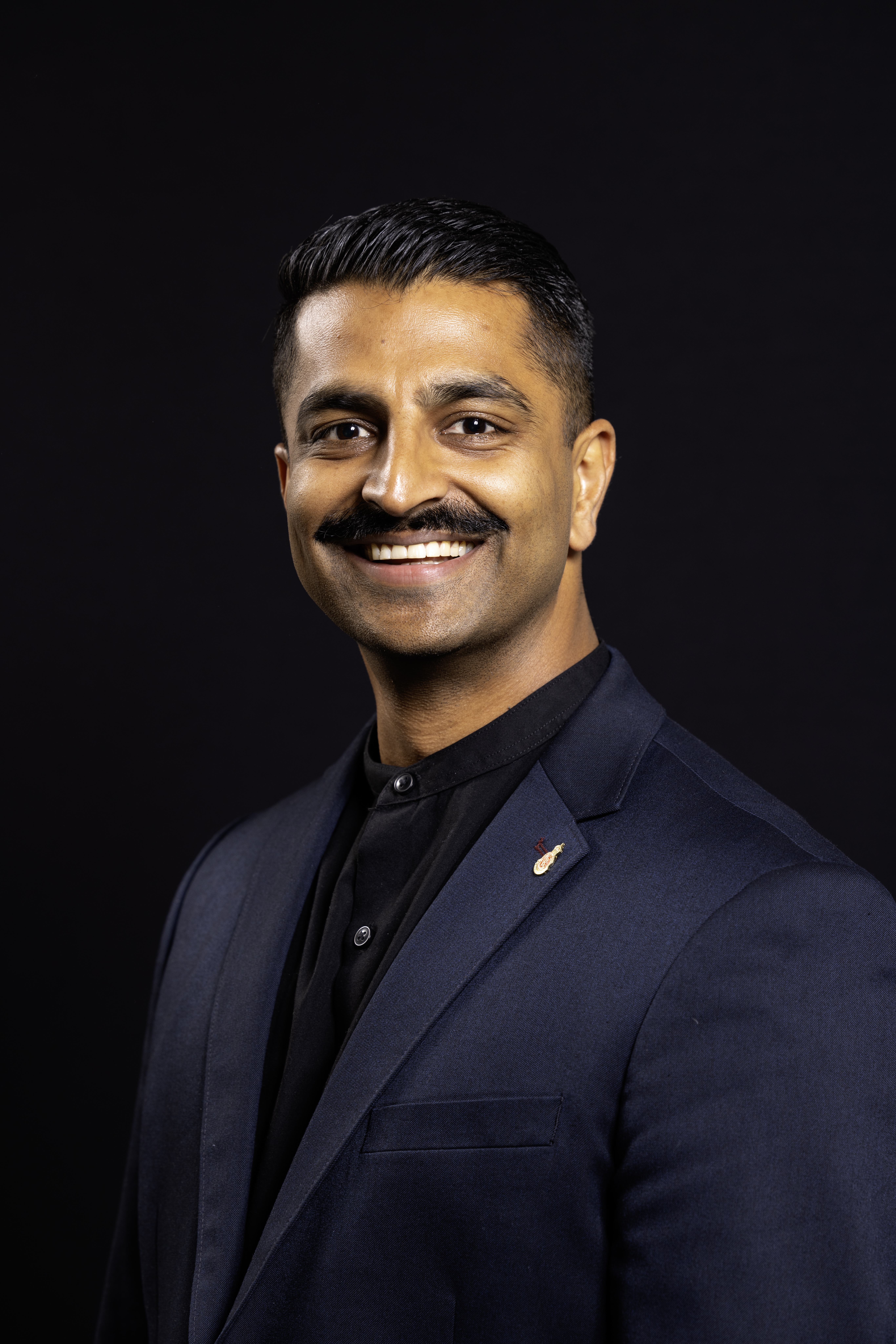 Headshot of Rav Savania