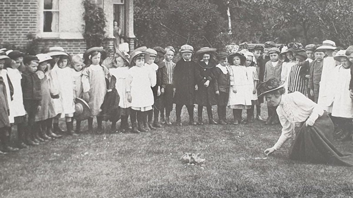 Eliza Chattaway with schoolchildren, learning outdoors