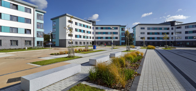 Bridges hall of residence at the University of Reading against a blue sky. 