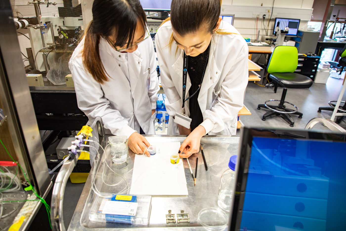 Pharmacy student Bozhana and colleague in a pharmacy lab