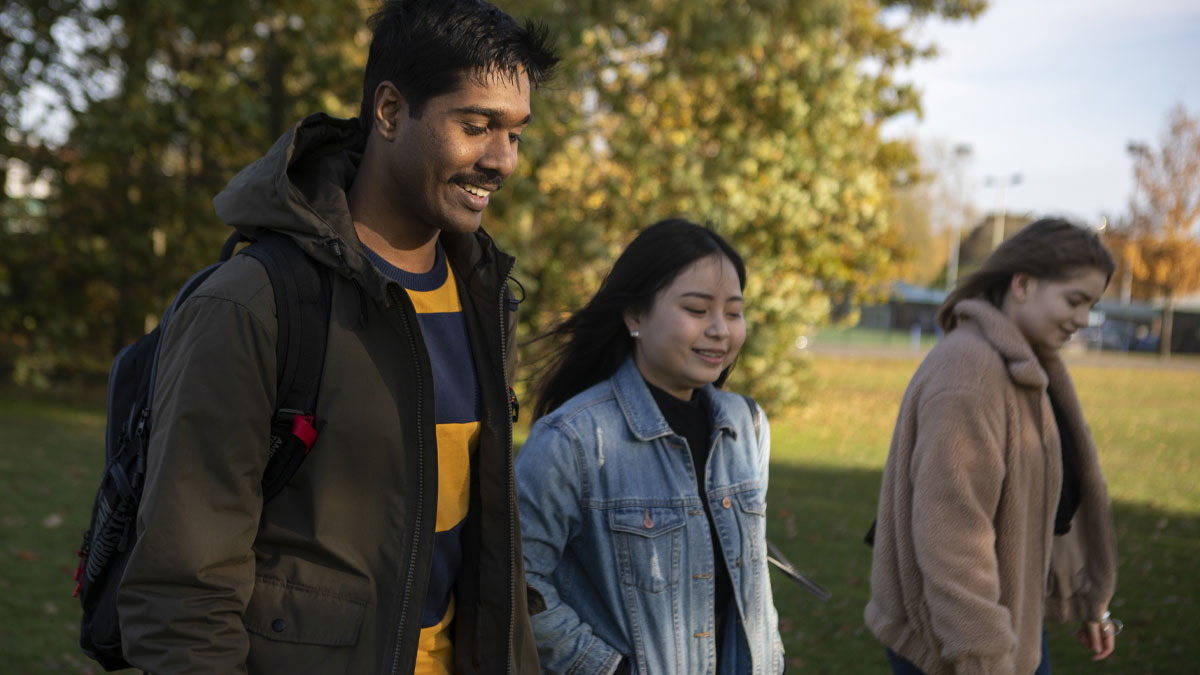 Three people walking - Wellbeing